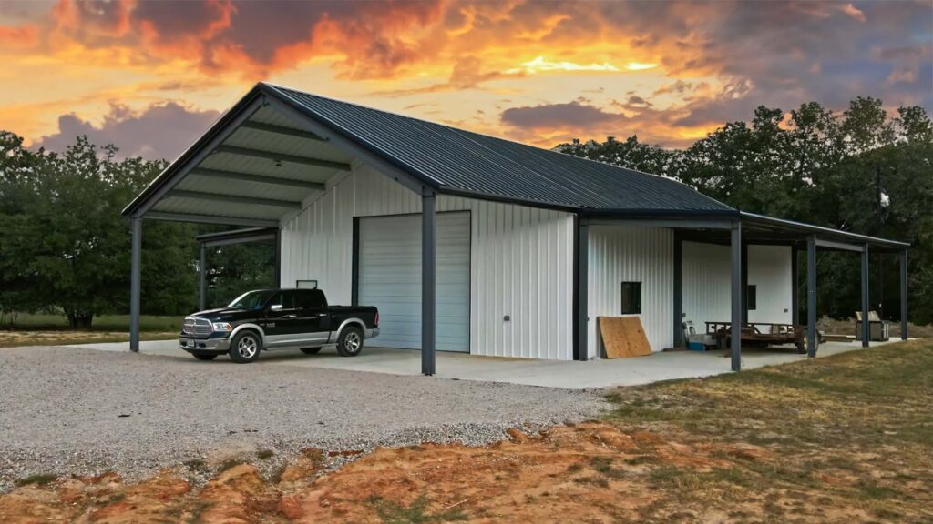 Barndominium residential steel building in Texas shot during the sunset