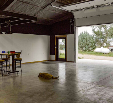 Great Western Buildings Steel Barndominium in Colorado interior with dog sleeping on the floor