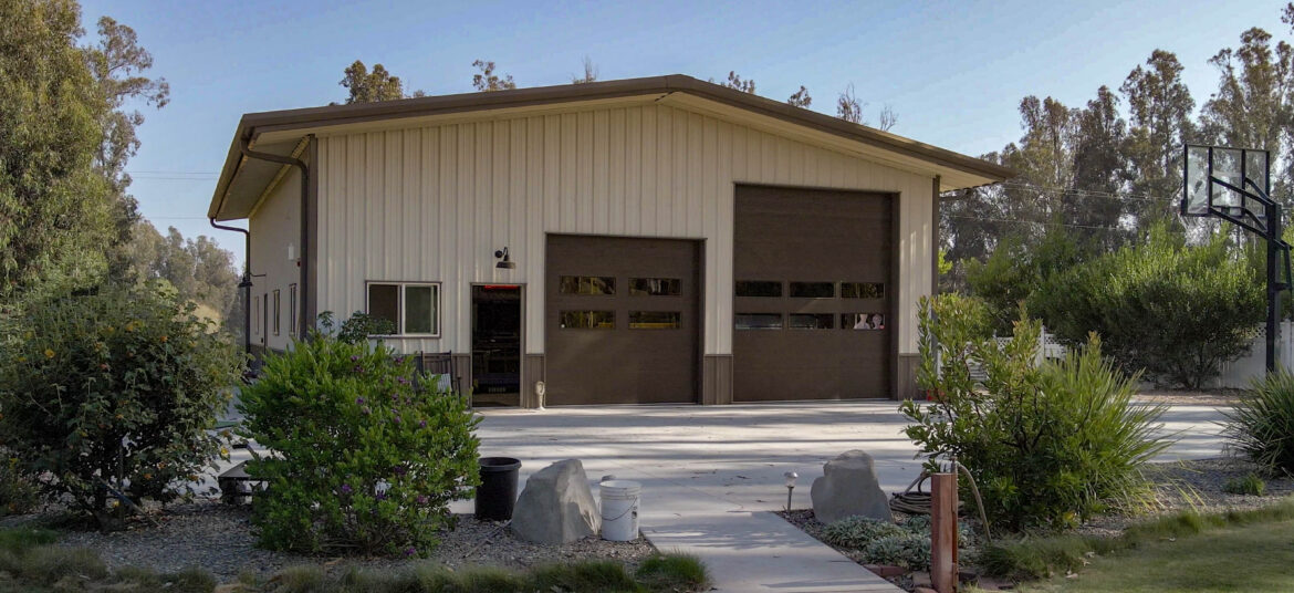 Great Western Buildings Steel Building in California with Rock Wall and Golf Simulator-15