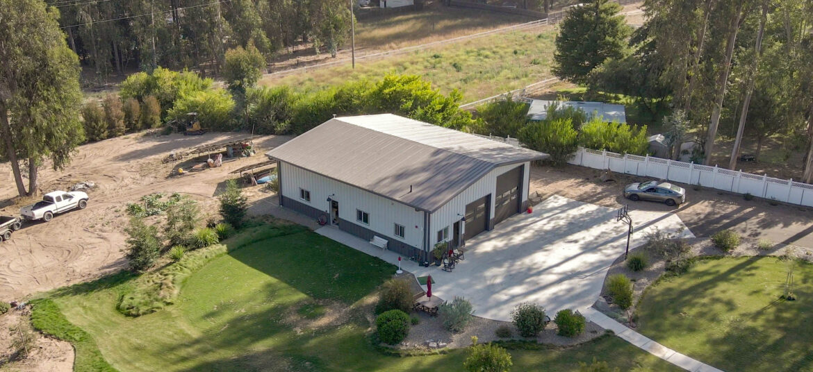 Great Western Buildings Steel Building in California with Rock Wall and Golf Simulator-17