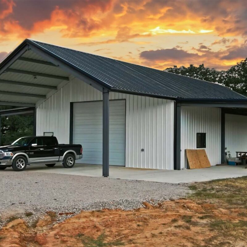 Barndominium residential steel building in Texas shot during the sunset