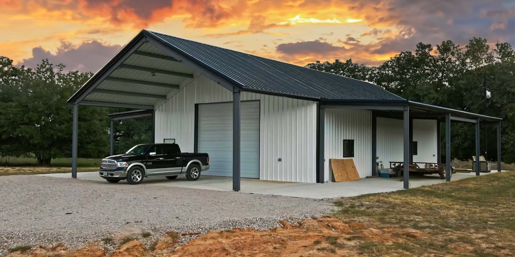 Barndominium residential steel building in Texas shot during the sunset